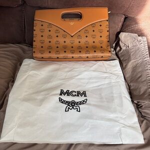 MCM Brown Monogram Clutch with Handle Cutout